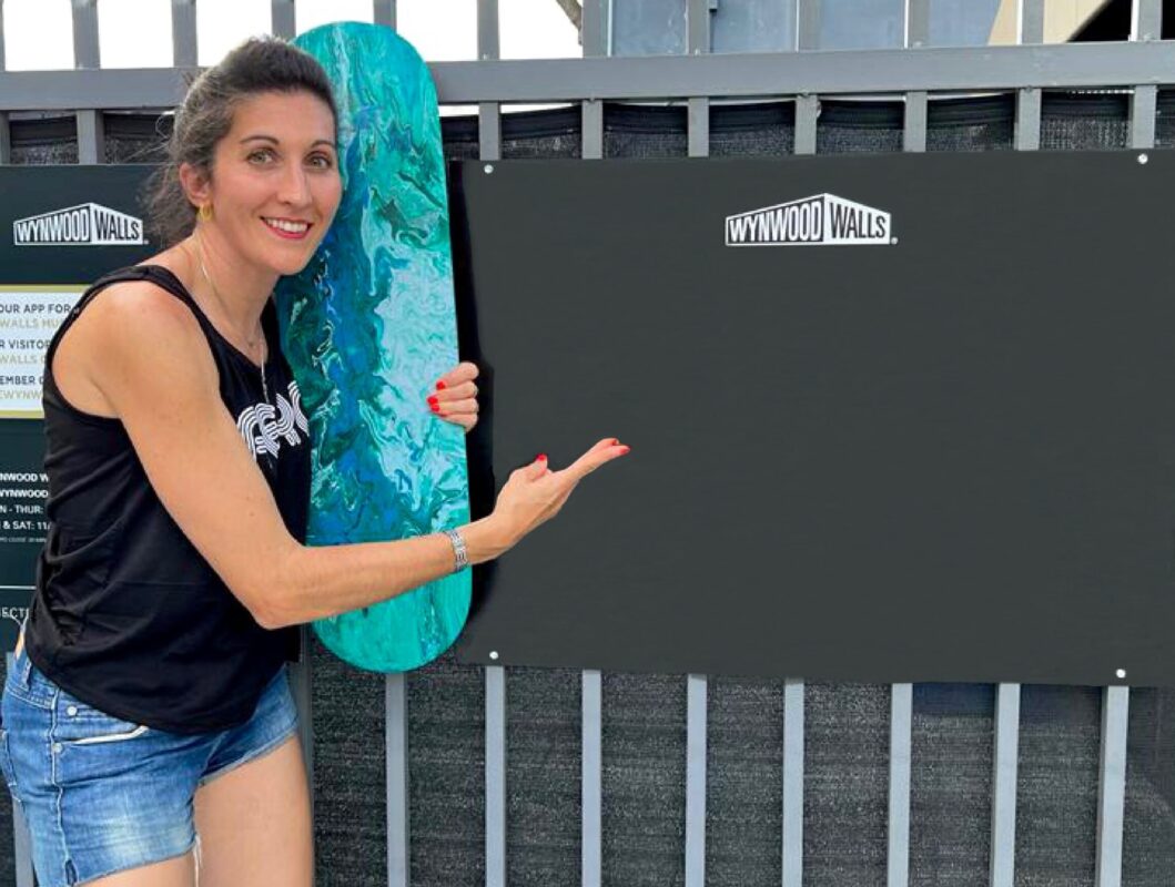 SarArtist painting in Miami, Florida, USA.